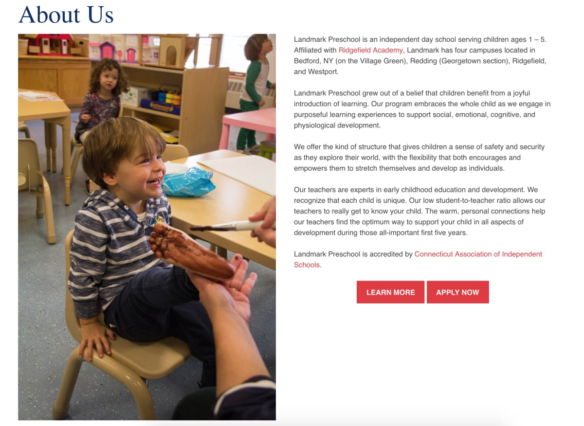 Landmark Preschool "About Us" page photo of preschooler having his foot painted